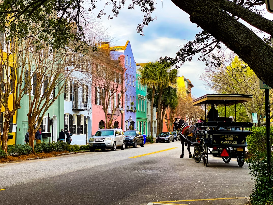 Painted houses and a horse carriage in Charleston